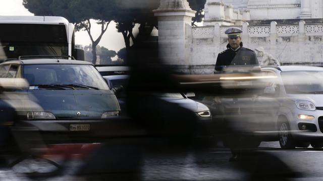 La circulation est responsable d'une importante pollution à Rome. [AP Photo/Keystone - Gregorio Borgia]