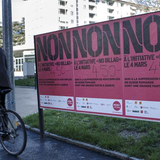 Affiche des opposants à l'initiative, dans une rue de Gen [Keystone - Salvatore Di Nolfi]