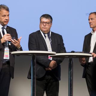 Gilles Marchand, Philippe Amez-Droz, et Christophe Buechi en octobre 2017. [Keystone - Cyril Zingaro]