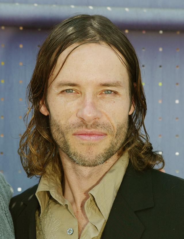 Guy Pearce lors de la première du film "Two Brothers" dans les studios Universal (2004). [Getty Images North America / AFP - Kevin Winter]