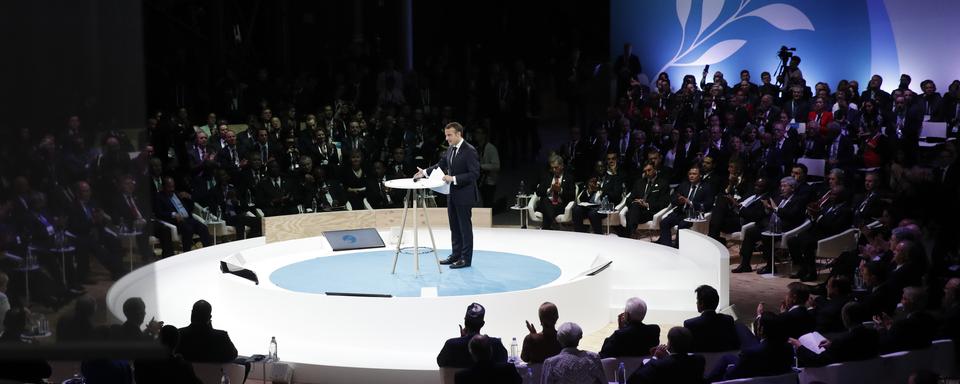 Emmanuel Macron ouvre le Forum de Paris sur la paix, le 11 novembre 2018. [Pool/AFP - Yoan Valat]