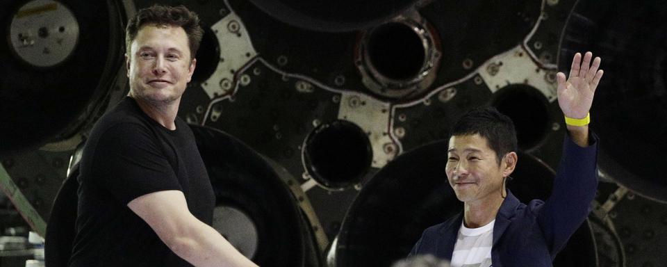 Le patron de SpaceX Elon Musk et le Japonais Yusaku Maezawa à Hawthorne en Californie. [AP/Keystone - Chris Carlson]