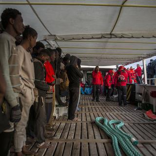 311 migrants ont été secourus le 21 décembre à bord de trois embarcations précaires. [AP/Keystone - Olmo Calvo]