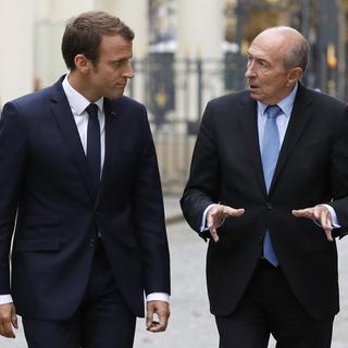 Emmanuel Macron aux côtés de Gérard Collomb. [EPA/Keystone - François Guillot]