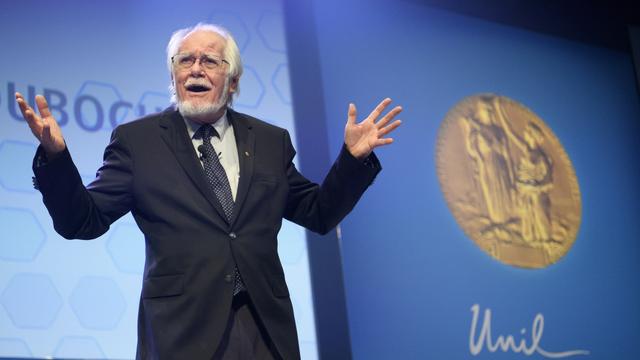 Le professeur Jacques Dubochet, Prix Nobel de Chimie, lors de la cérémonie le célébrant à l'Université de Lausanne. [Keystone - Laurent Gillieron]