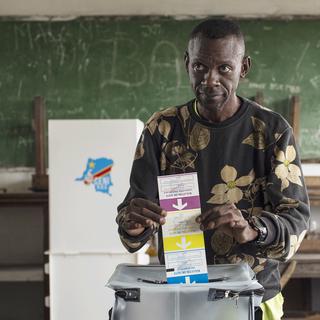 Les Congolais aux urnes pour un scrutin présidentiel sous haute tension. [EPA/Keystone - Stefan Kleinowitz]