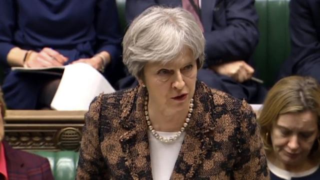 Theresa May fait le point sur l'enquête sur l'empoisonnement d'un ex-espion russe. [Keystone - PA via AP]