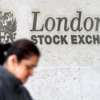 Le London Stock Exchange a accepté les femmes en 1973. [Keystone - EPA/Andy Rain]