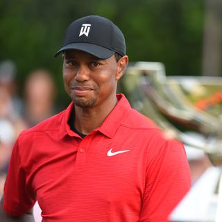 La légende du golf Tiger Woods est de retour: l'Américain a remporté son premier tournoi professionnel depuis août 2013. [USA Today Sports/Reuters - John David Mercer]