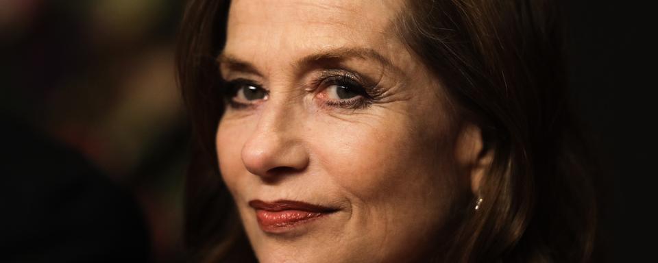 L'actrice Isabelle Huppert à la projection du film "Eva" à la 68ème édition de la Berlinale à Berlin, le 17 février 2018. [AP Photo/Keystone - Markus Schreiber]