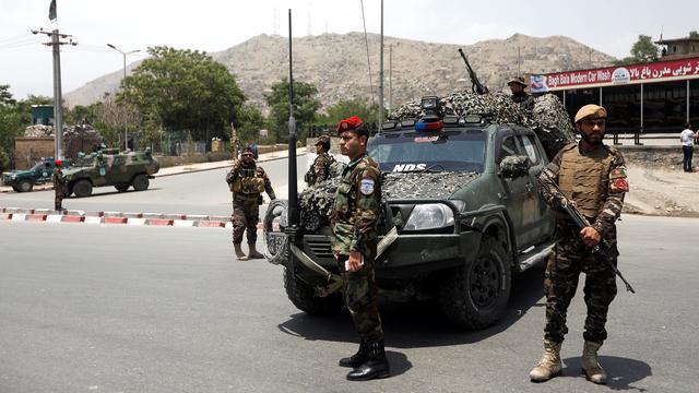 Les forces de sécurité afghanes sur les lieux d'un attentat-suicide à Kaboul, lundi 4 juin 2018. [Reuters - Omar Sobhani]