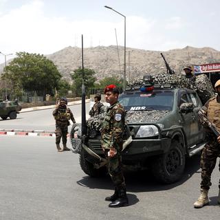 Les forces de sécurité afghanes sur les lieux d'un attentat-suicide à Kaboul, lundi 4 juin 2018. [Reuters - Omar Sobhani]
