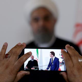 Le président iranien Hassan Rohani et le chancelier autrichien Sebastian Kurz filmés lors d'une conférence de presse, le 4 juillet 2018. [Reuters - Lisi Niesner]