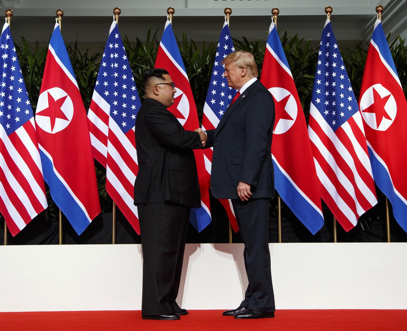 Kim Jong-un et Donald Trump à Singapour, le 12 juin 2018. [KEYSTONE - EVAN VUCCI]