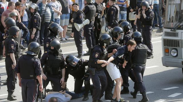 Plus d'un millier de ses partisans ont été arrêtés samedi lors de manifestations antigouvernementales en Russie. [Keystone - Maxim Shipenkov - EPA]