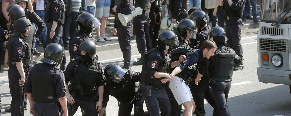 Plus d'un millier de ses partisans ont été arrêtés samedi lors de manifestations antigouvernementales en Russie. [Keystone - Maxim Shipenkov - EPA]