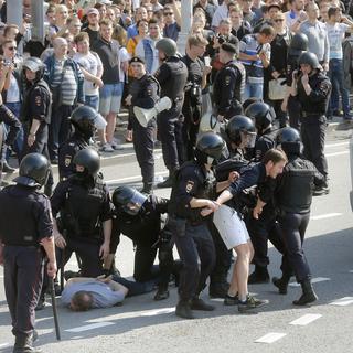 Plus d'un millier de ses partisans ont été arrêtés samedi lors de manifestations antigouvernementales en Russie. [Keystone - Maxim Shipenkov - EPA]