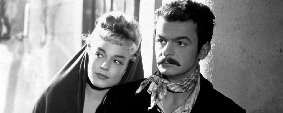 Simone Signoret et Serge Reggiani dans "Casque d'or", de Jacques Becker, sorti en 1952.
Robert et Raymond Hakim/Collection ChristopheL
AFP [Robert et Raymond Hakim/Collection ChristopheL]