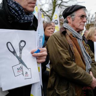 Les journalistes de l'ATS manifestent le 1er février 2018 à Lausanne. [AFP - Fabrice Coffrini]