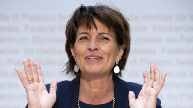 Doris Leuthard était émue en annonçant sa démission. [Keystone - Anthony Anex]