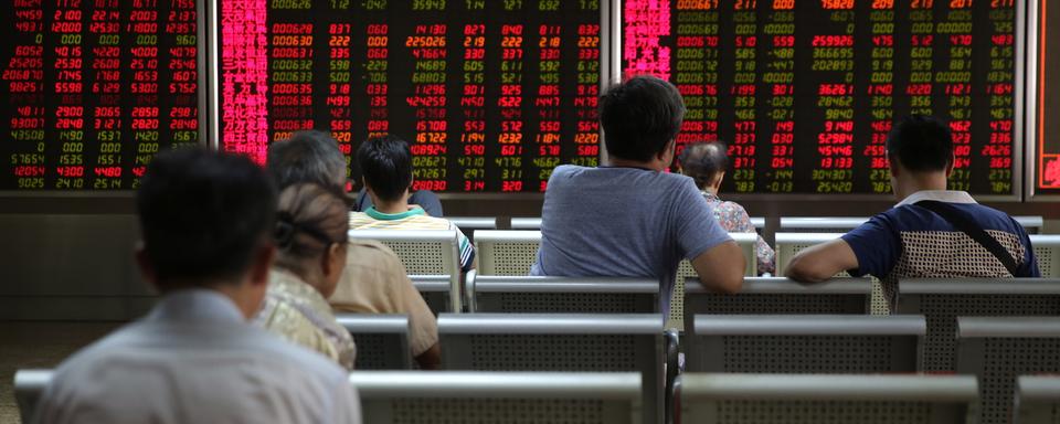 La bourse de Shanghai est à son plus bas niveau depuis 2016. [EPA/Keystone - Wu Hong]