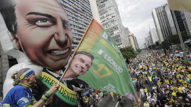 Des partisans du candidat d'extrême droite à la présidentielle brésilienne, Jair Bolsonaro, le 30 septembre 2018. [EPA/Keystone - Sebastiao Moreira]