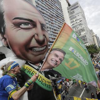Des partisans du candidat d'extrême droite à la présidentielle brésilienne, Jair Bolsonaro, le 30 septembre 2018. [EPA/Keystone - Sebastiao Moreira]