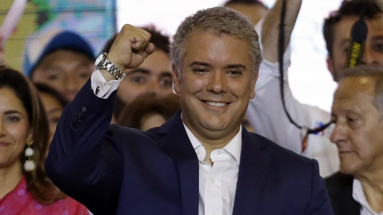 Le président élu de Colombie, Ivan Duque, célèbre sa victoire. [AP/Keystone - Fernando Vergara]