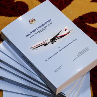 Le rapport de l'enquête de sécurité sur la disparition du MH370. [EPA - Fazry Ismail]