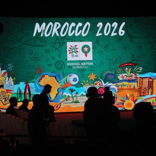 Le Maroc est candidat au Mondial 2026 face au trio Etats-Unis-Mexique-Canada. [AP/Keystone - Abdeljalil Bounhar]