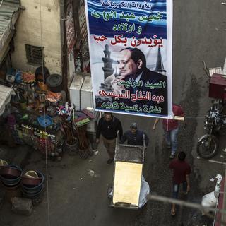 Des affiches électorales représentant le président sortant Abdel Fattah al-Sissi dans les rues du Caire. [AFP - Khaled Desouki]