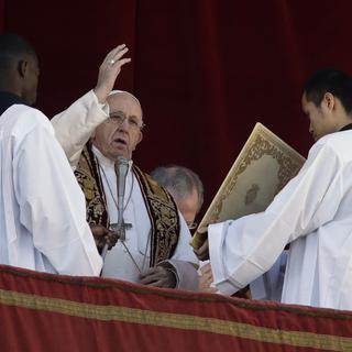 Le Pape François lors de sa bénédiction urbi et orbi, ce mardi 25 décembre. [Ap Photo/Keystone - Alessandra Tarantino]