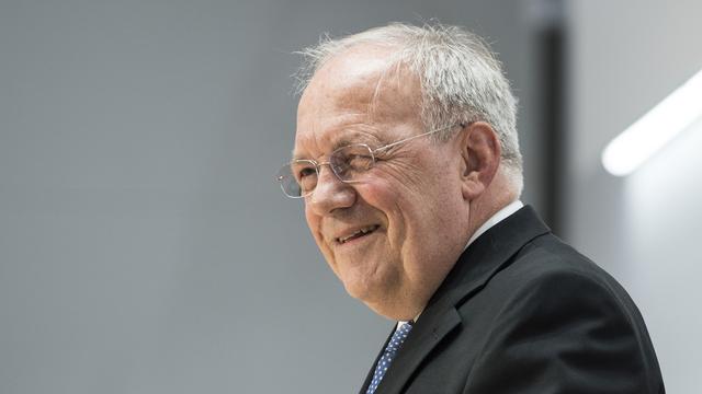 Johann Schneider-Ammann souriant après l'annonce de sa démission. [Keystone - Peter Schneider]