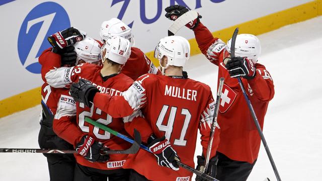 La joie des Suisses après le 3-2 de Joël Vermin. [Salvatore Di Nolfi]