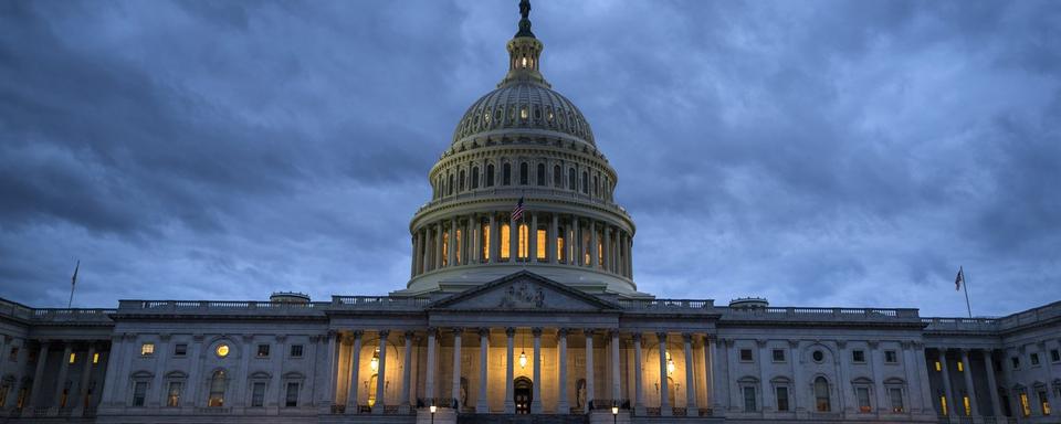 Vue sur le Capitole à Washington, à la veille de l'entrée en vigueur du "shutdown". [Keystone - EPA/Jim Lo Scalzo]