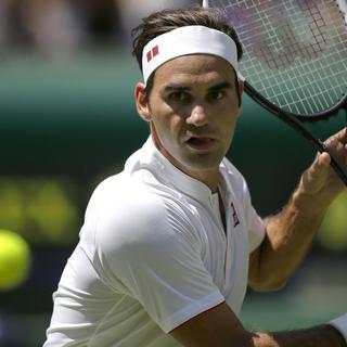 Roger Federer vêtu par son nouveau sponsor lundi 02.07.2018 à Wimbledon. [AP/Keystone - Tim Ireland]