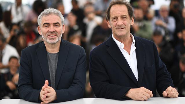 Le cinéaste Stéphane Brizé et l'acteur Vincent Lindon au 71e Festival de Cannes pour le film "En Guerre". [AFP - Anne-Christine Poujoulat]