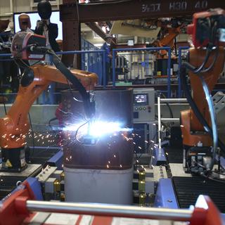 La robotisation créera plus d'emplois en Suisse qu'elle n'en détruira, affirme une étude. (image d'illustration) [Keystone - Koji Sasahara]
