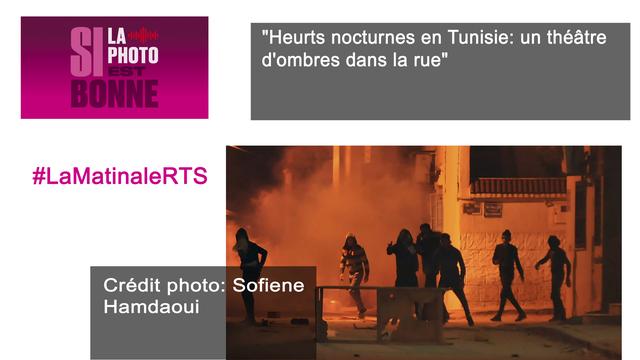 "Heurts nocturnes en Tunisie: un théâtre d'ombres dans la rue". [AFP - Sofiene Hamdaoui]