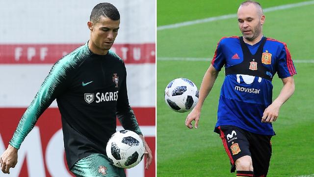 Habitués à s'affronter en Liga, Cristiano Ronaldo et Andrés Iniesta croiseront le fer vendredi. [Keystone - P.Novais/D.Castello]