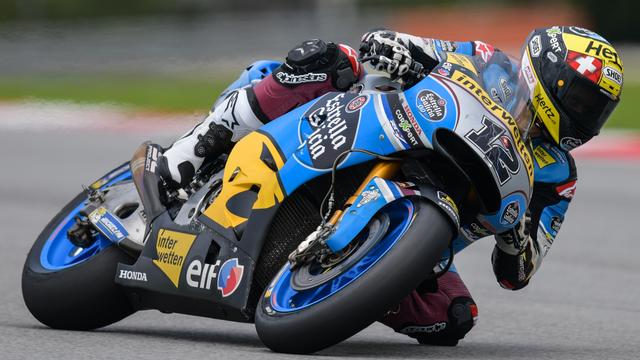 Thomas Lüthi lors du premier jour de la pré-saison de MotoGP à Sepang (Malaisie), le 28 janvier 2018. [AFP - MOHD RASFAN]