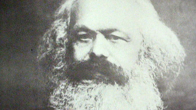 Portrait de Karl Marx dans la chambre d'un apprenti genevois en 1968. [RTS]