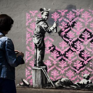 Banksy pourrait être l'auteur des tags réalisés à Paris. [AFP - Philippe Lopez]