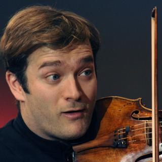 Le violoniste français Renaud Capuçon aux côtés du Svetlanov State Academic Symphony Orchestra le 24 mars 2012 à Moscou. [AFP - Sergey Pyatakov]