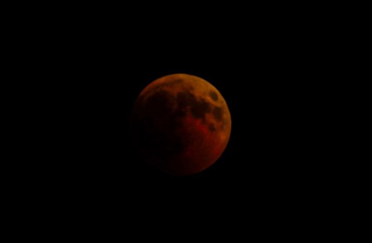 L'éclipse vue depuis Gaza. [AFP - MAHMUD HAMS]