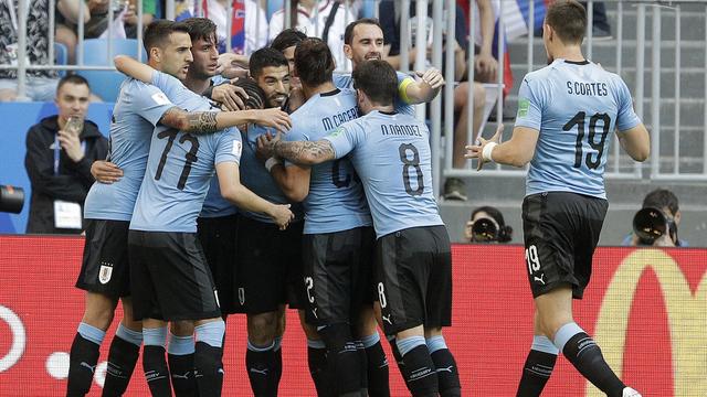 Les joueurs uruguayens fêtent la réussite du 1-0 de Luis Suarez. [Gregorio Borgia]