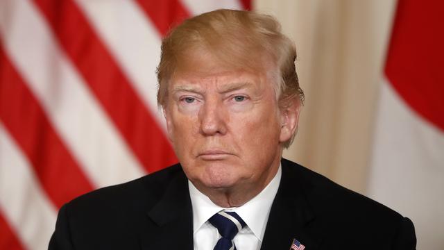 Donald Trump lors de sa rencontre avec le Premier ministre japonais Shinzo Abe. [Kestone - AP Photo/Pablo Martinez Monsivais]