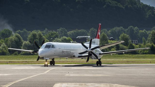 Un appareil de SkyWork sur le tarmac de Lugano-Agno en juillet 2018. [Ti-Press/Keystone - Pablo Gianinazzi]