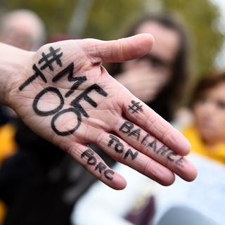 Les hashtags #Metoo et #Balancetonporc ont secoué internet après les révélations de harcèlement sexuel liées à l'affaire Weinstein. [AFP - Bertrand GUAY]
