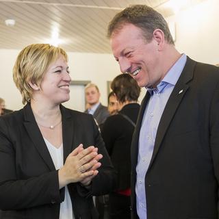 Valérie Piller Carrard et Didier Castella sont toujours en course pour le Conseil d'Etat fribourgeois. [Keystone - Cyril Zingaro]
